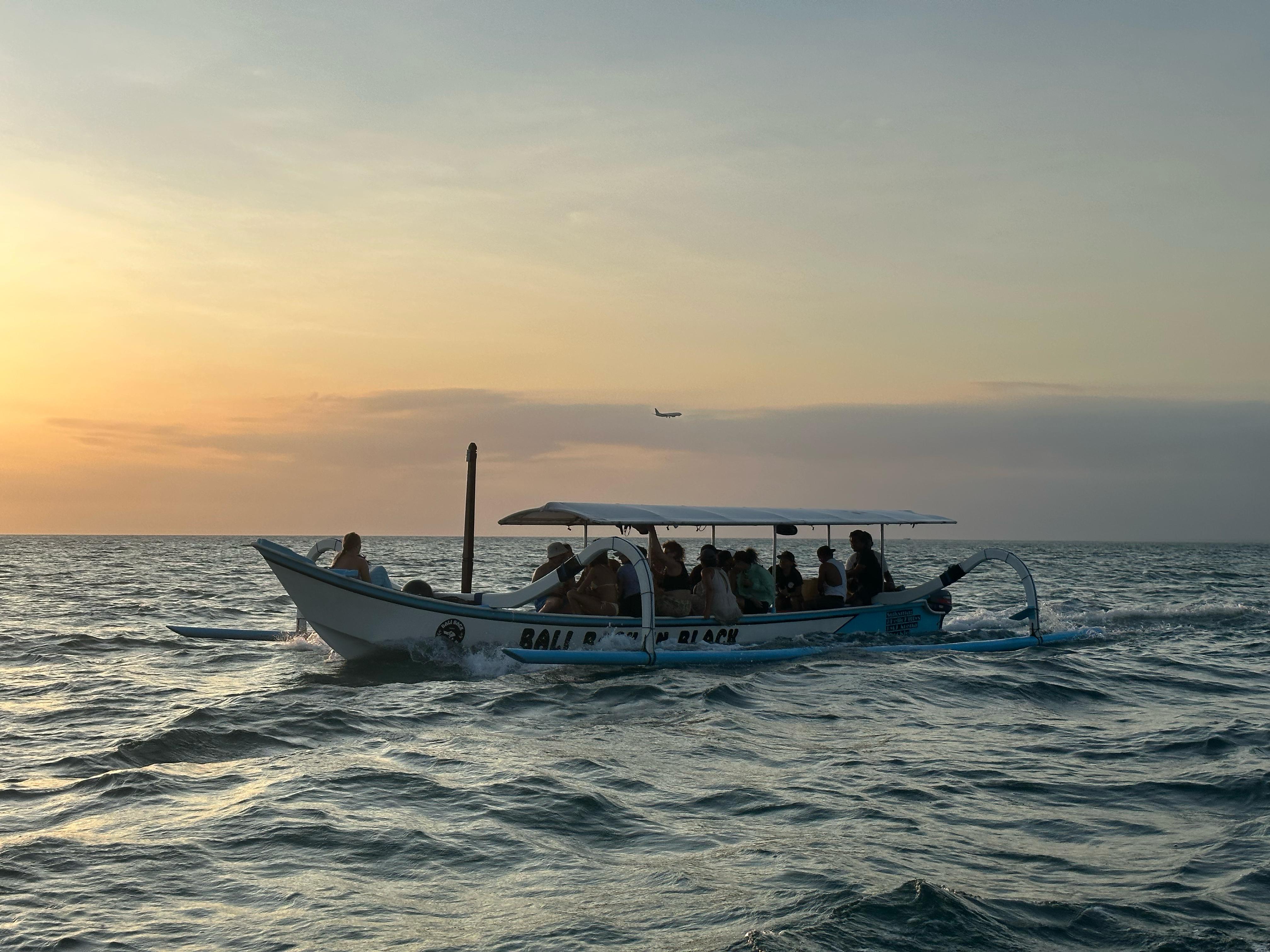 Bali Back In Black boat at golden hour on the Indian Ocean